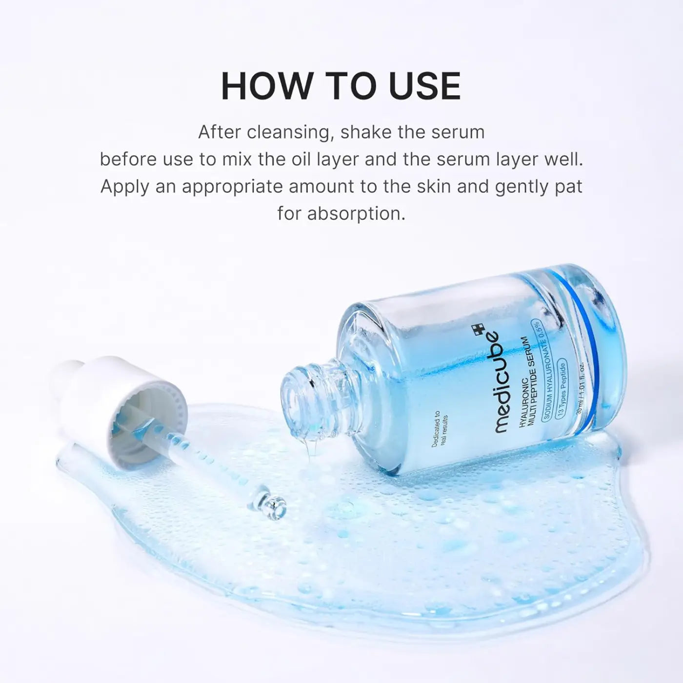 Clear glass bottle with white dropper cap containing light blue hyaluronic multi peptide pdrn serum 30ml
