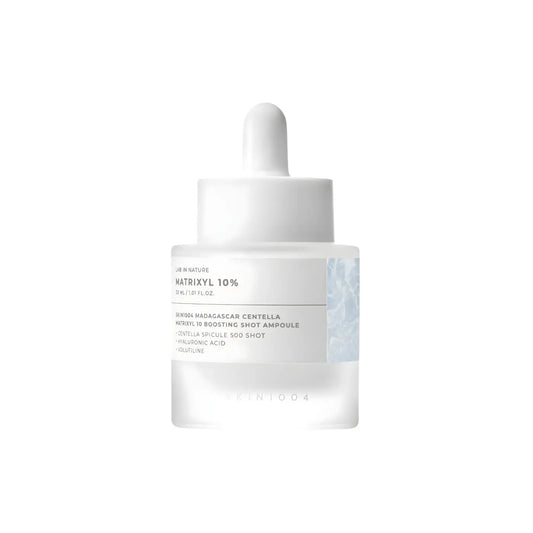 A minimalist white glass dropper bottle of madagascar centella matrixyl boosting shot ampoule with frosted label