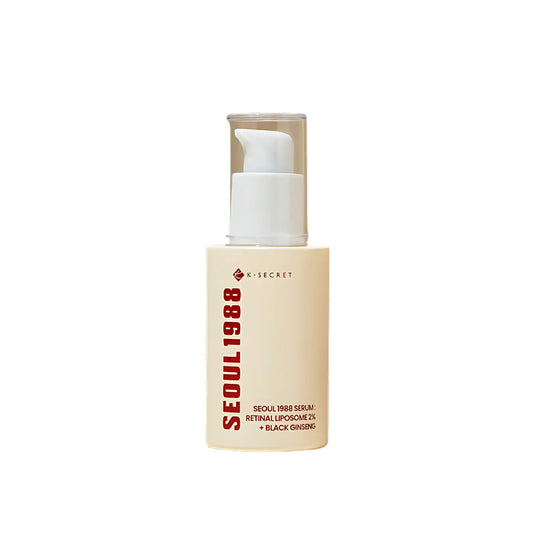 Beige cylindrical bottle of k-secret seoul 1988 serum with retinal liposome 2% and black ginseng from best korean skincare brands sa