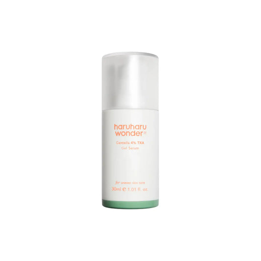 A sleek white cylindrical gel serum bottle with translucent cap and green base labeled haruharu wonder canteña 4% tka gel serum