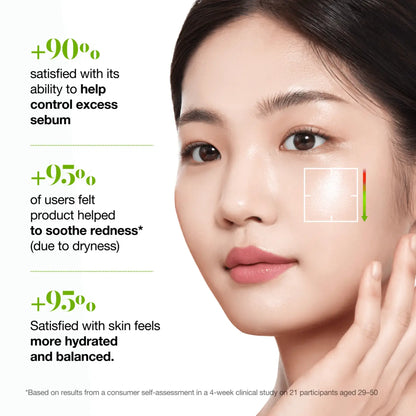 A woman with clear radiant skin gently touches her cheek using azelaic acid 3 cica skin clarifying toner