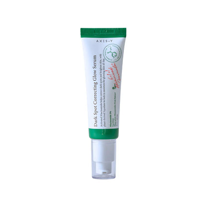 Green-topped white tube of axis-y dark spot correcting glow serum with clear pump dispenser for moisture barrier care