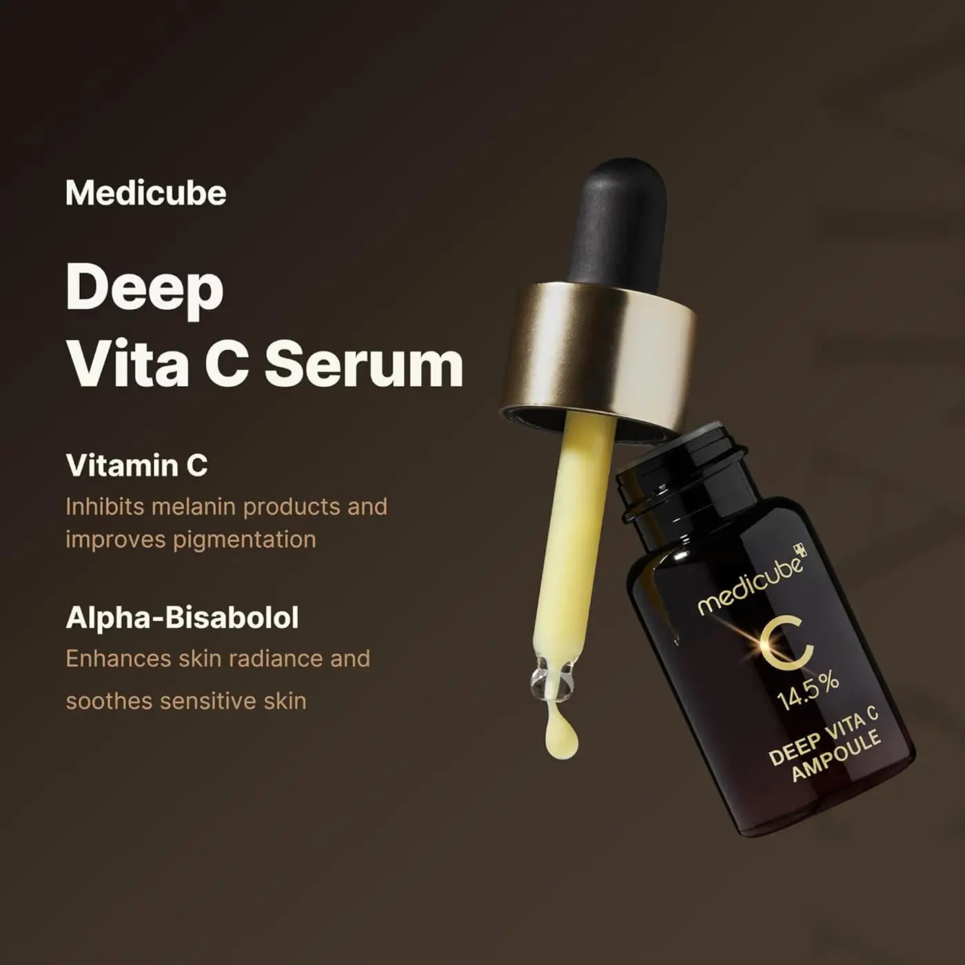 Medicube deep vita c ampoule in black glass with gold dropper dripping 14.5% vitamin c serum rich yellow liquid