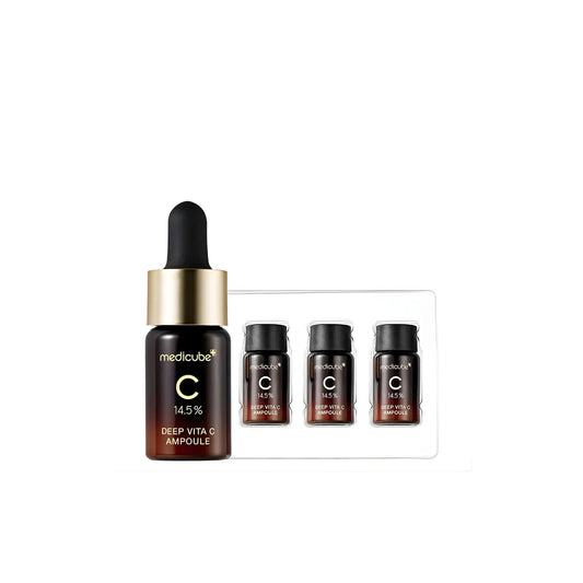 A sleek dark brown glass vita c ampoule with gold dropper from medicube deep vita collection best korean skincare brands sa