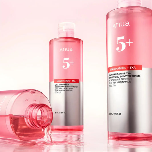 Pink anua 5+ niacinamide txa brightening booster toner 250ml in clear glass bottles with silver labels for brightening booster use