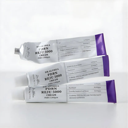 Three silver tubes with purple caps labeled dr in pdrn reju 5000 cream from the best korean skincare brands sa