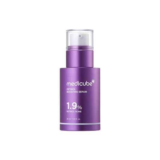 Purple metallic bottle of medicube retinol nmn boosting serum 30ml with clear pump for improving skin texture