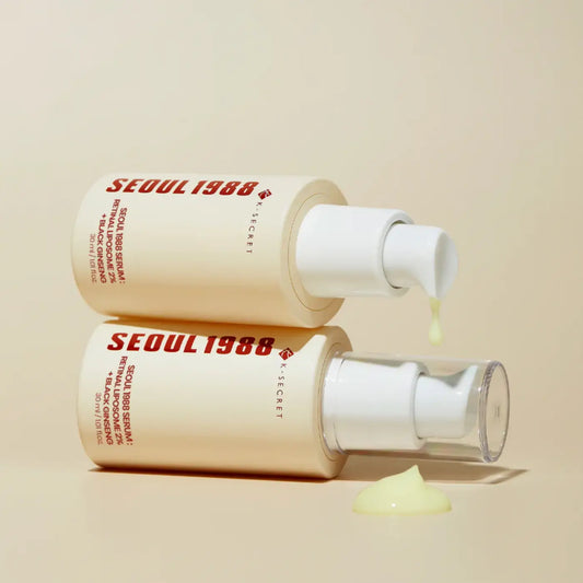 Cream beige k-secret seoul 1988 serum pump bottle with retinal liposome and black ginseng dripping pale yellow liquid